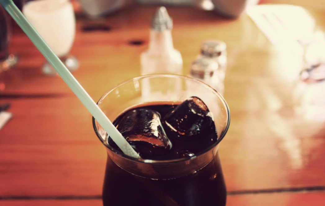 glass of iced coffee with straw